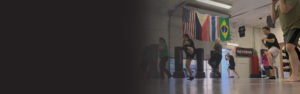 A group of students in a beginner kickboxing class